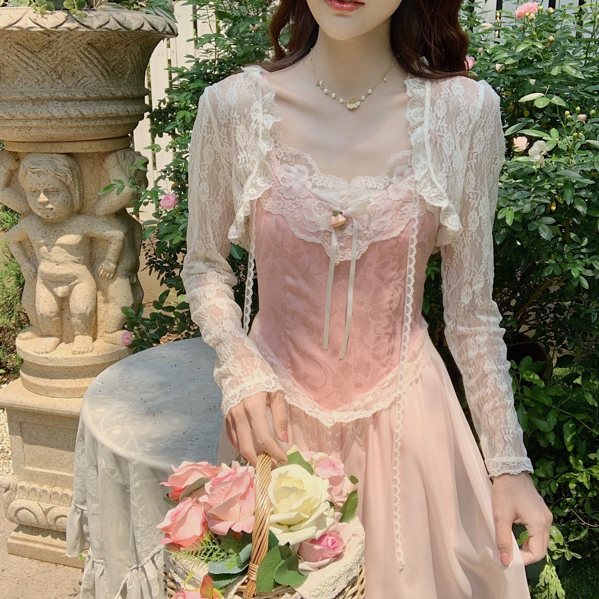 Pink “Princess” corset dress with french lace decoration featured